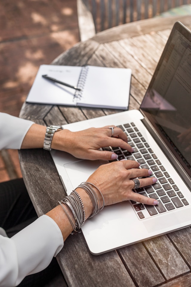 Person working at laptop computer