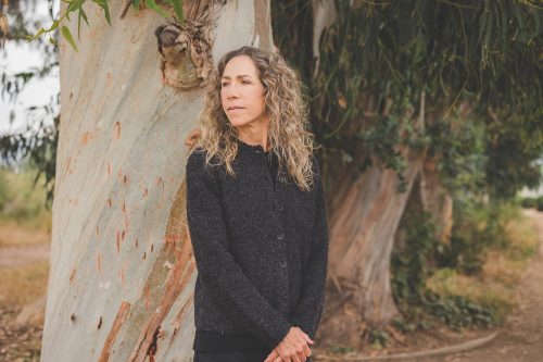 Joan portrait - standing against tree